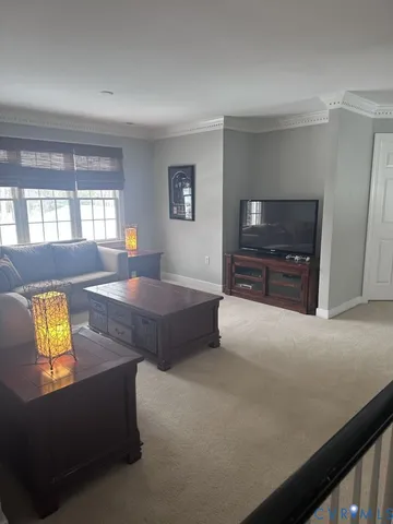 a kitchen with stainless steel appliances a stove a sink a microwave a refrigerator and cabinets