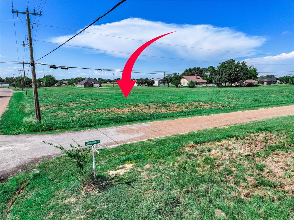 Tbd Tbd Loving Ranch Road Trinidad, TX 75163 - Photo 7 of 8 View of community with a lawn