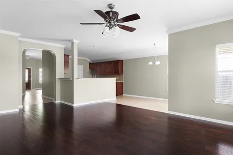 a kitchen with stainless steel appliances granite countertop a stove microwave and sink