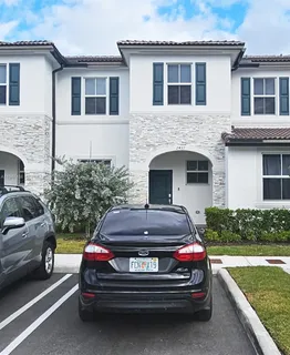 a house view with a garden space