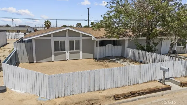 a front view of a house with a garage