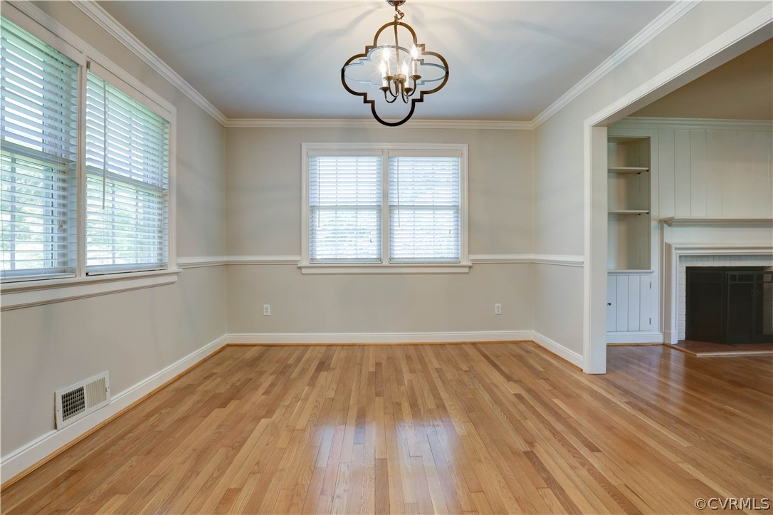 7741 Marilea Road Richmond, VA 23225 - Photo 15 of 44 a view of empty room with wooden floor and fan