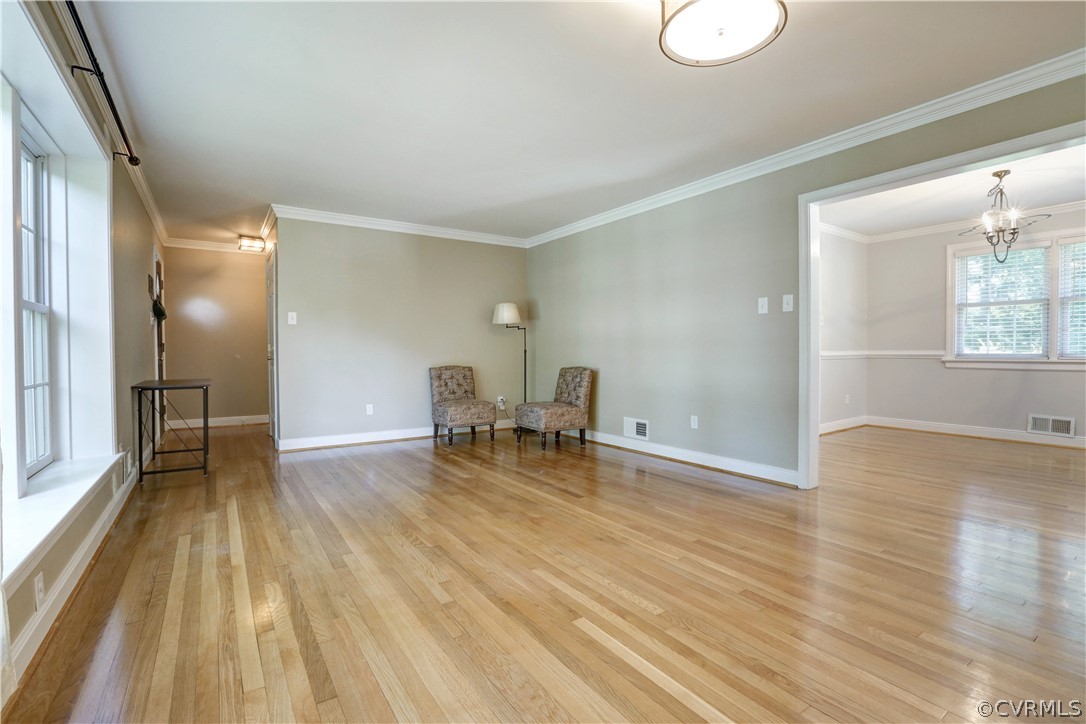 7741 Marilea Road Richmond, VA 23225 - Photo 16 of 44 a view of empty room with wooden floor and fan