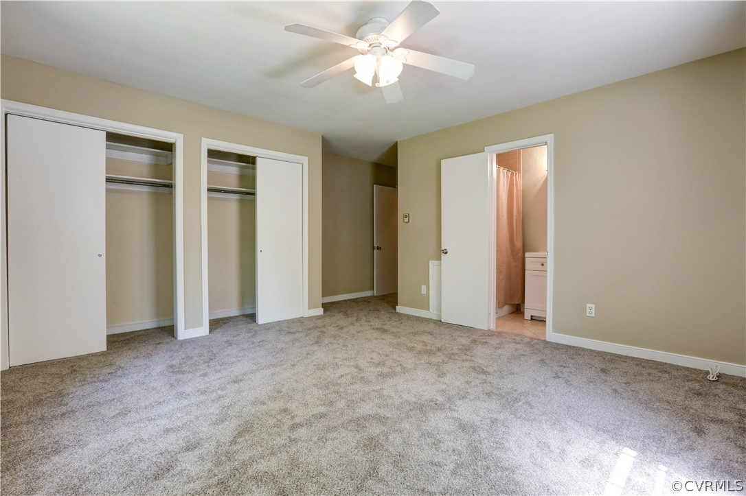 7741 Marilea Road Richmond, VA 23225 - Photo 19 of 44 an empty room with closet and a ceiling fan