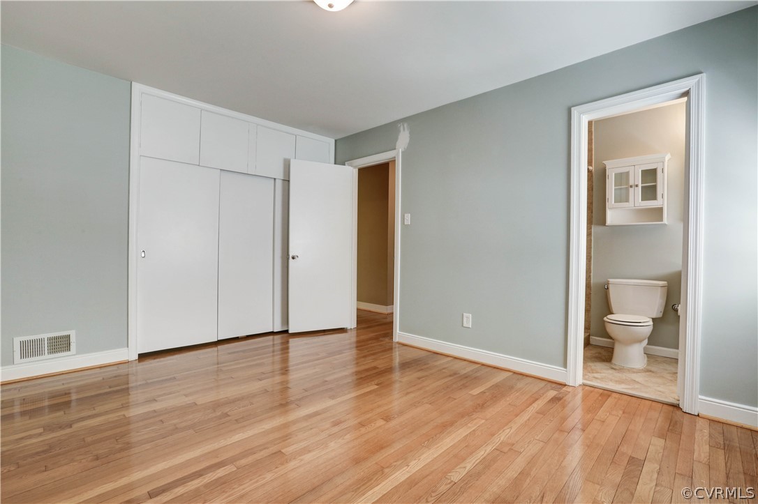 7741 Marilea Road Richmond, VA 23225 - Photo 25 of 44 a view of livingroom with hardwood floor and a ceiling fan