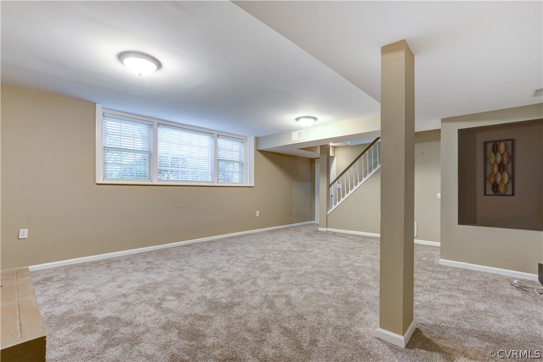 7741 Marilea Road Richmond, VA 23225 - Photo 33 of 44 an empty room with windows and closet