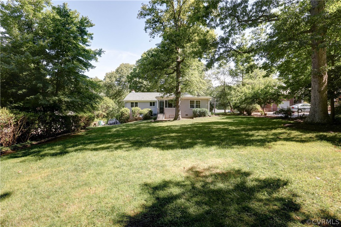 7741 Marilea Road Richmond, VA 23225 - Photo 38 of 44 a view of a house with a big yard