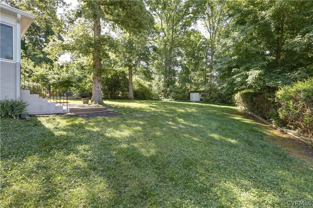 7741 Marilea Road Richmond, VA 23225 - Photo 39 of 44 a view of outdoor space with deck and yard