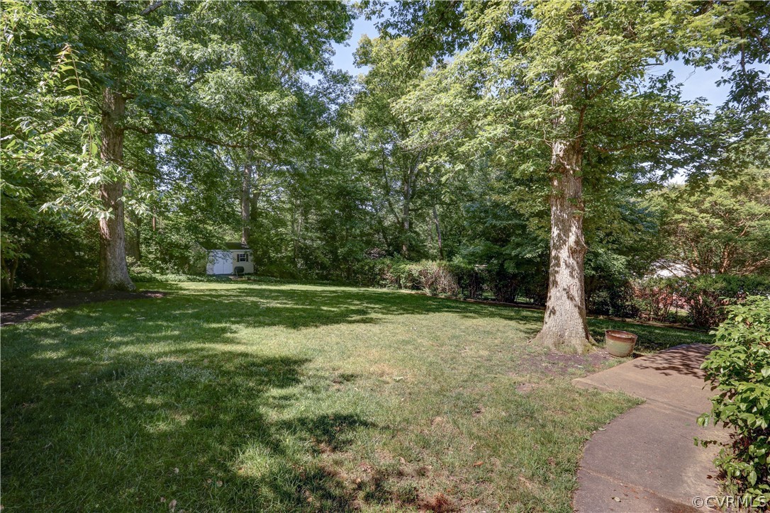 7741 Marilea Road Richmond, VA 23225 - Photo 40 of 44 a view of a field with trees in the background