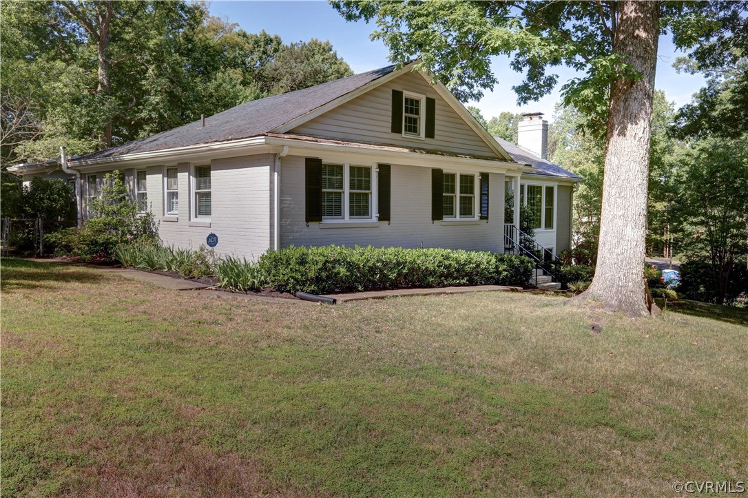 7741 Marilea Road Richmond, VA 23225 - Photo 44 of 44 a front view of a house with a garden