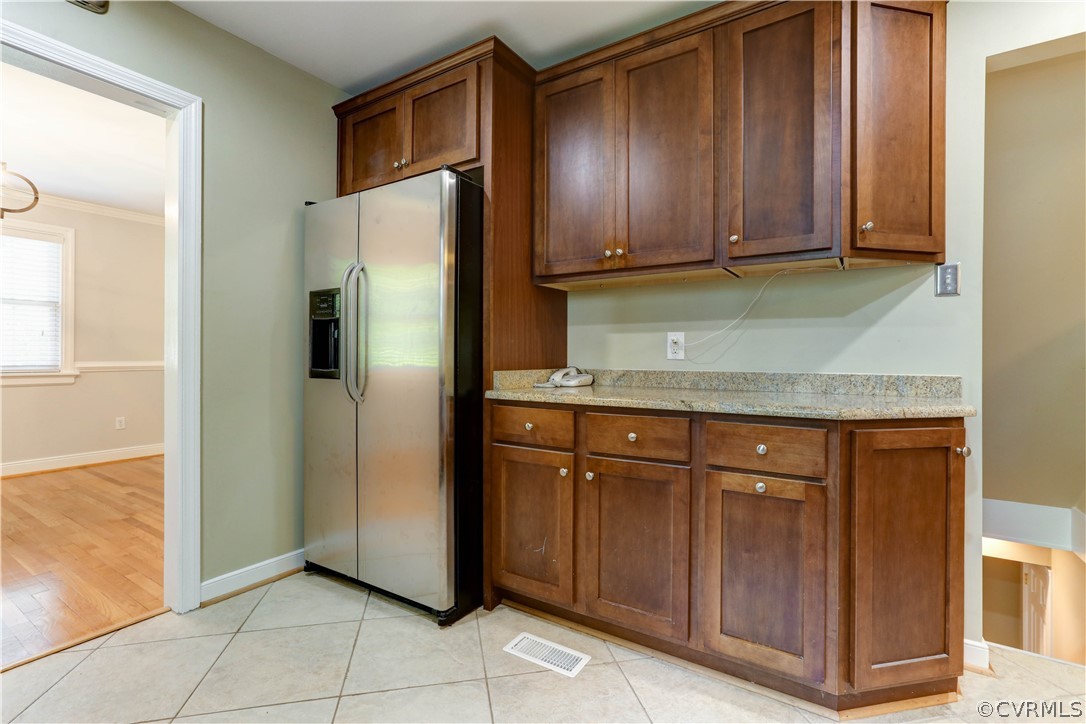 7741 Marilea Road Richmond, VA 23225 - Photo 8 of 44 a kitchen with stainless steel appliances granite countertop a refrigerator and a sink