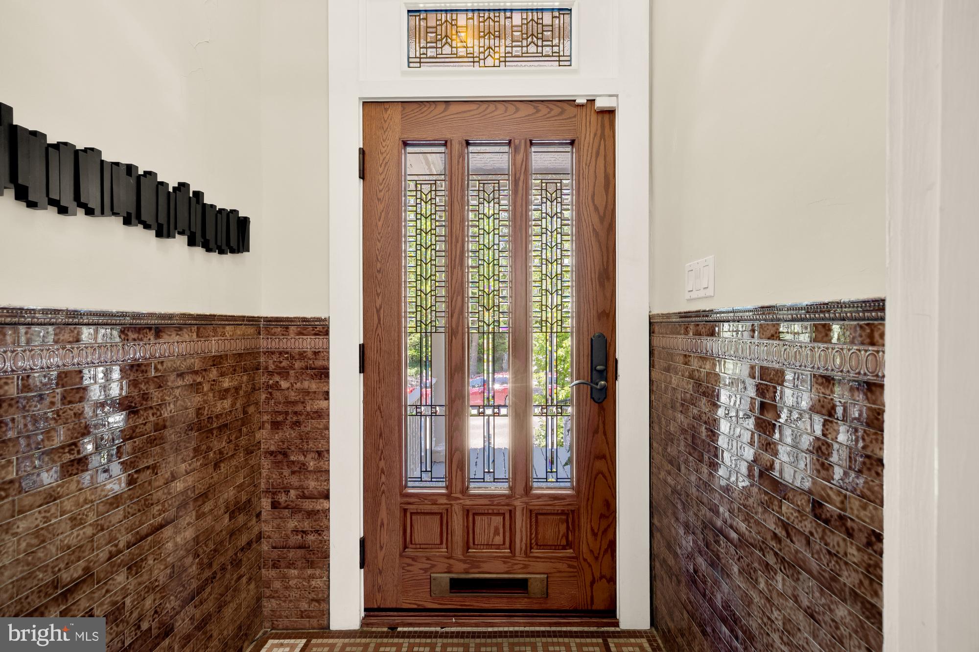 1834 Park Road Northwest Washington, DC 20010 - Photo 7 of 67 Stained glass door and historic vestibule tile
