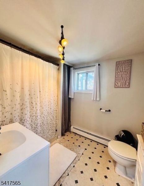 44 Budd Lake Heights Road Budd Lake, NJ 07828 - Photo 11 of 12 a bathroom with a sink a toilet and shower