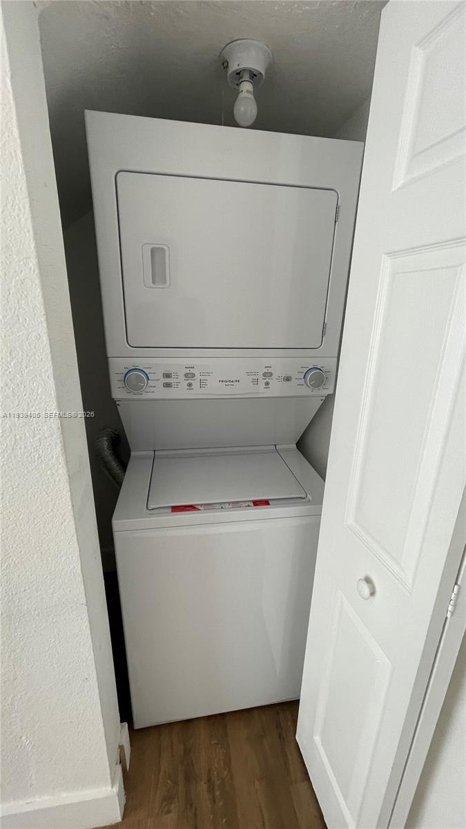 209 Northwest 84rd Street, Unit 209 Miami, FL 33150 - Photo 7 of 14 a utility room with dryer and washer
