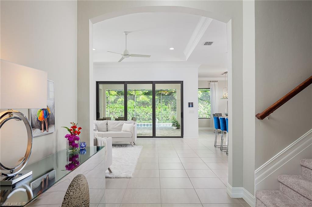 1423 Mockingbird Drive Naples, FL 34120 - Photo 13 of 32 a very nice looking room with a large window