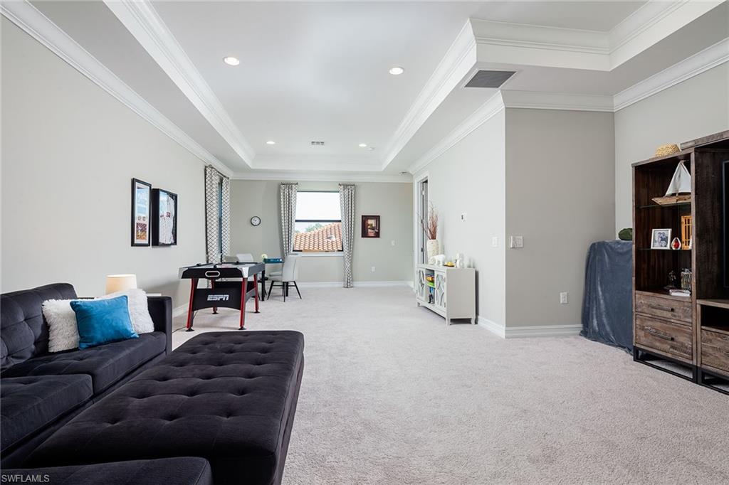 1423 Mockingbird Drive Naples, FL 34120 - Photo 24 of 32 a living room with furniture a view of bedroom and a couch