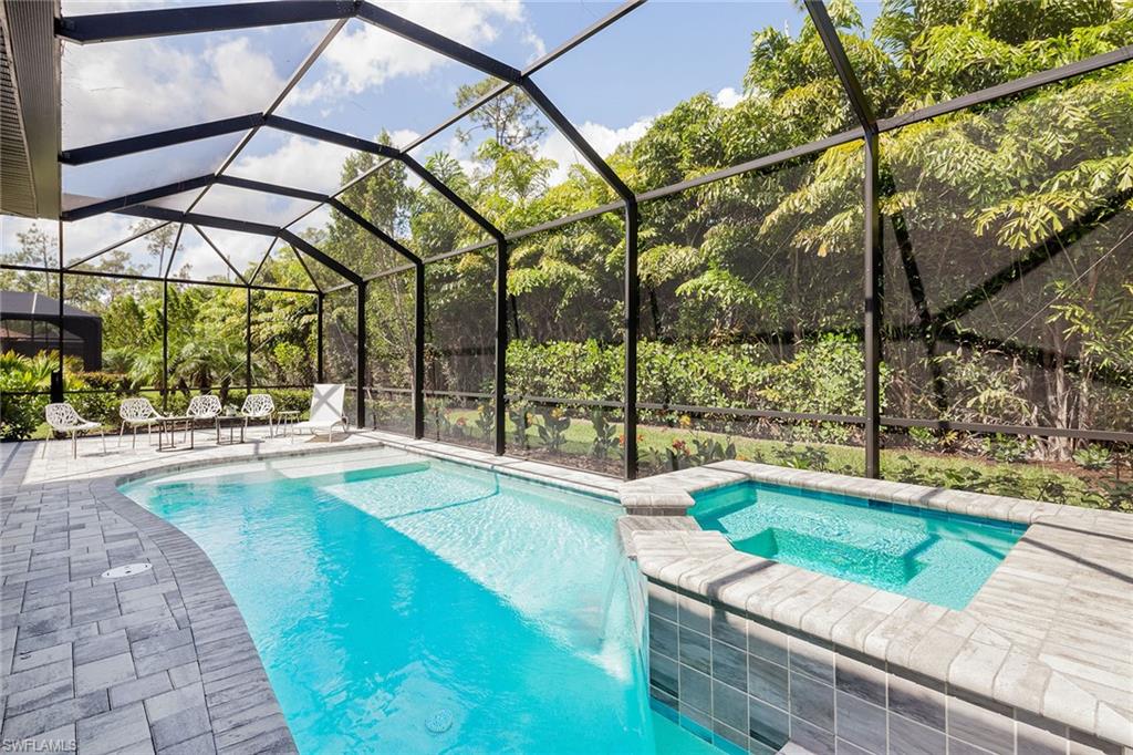 1423 Mockingbird Drive Naples, FL 34120 - Photo 28 of 32 a view of swimming pool with a patio