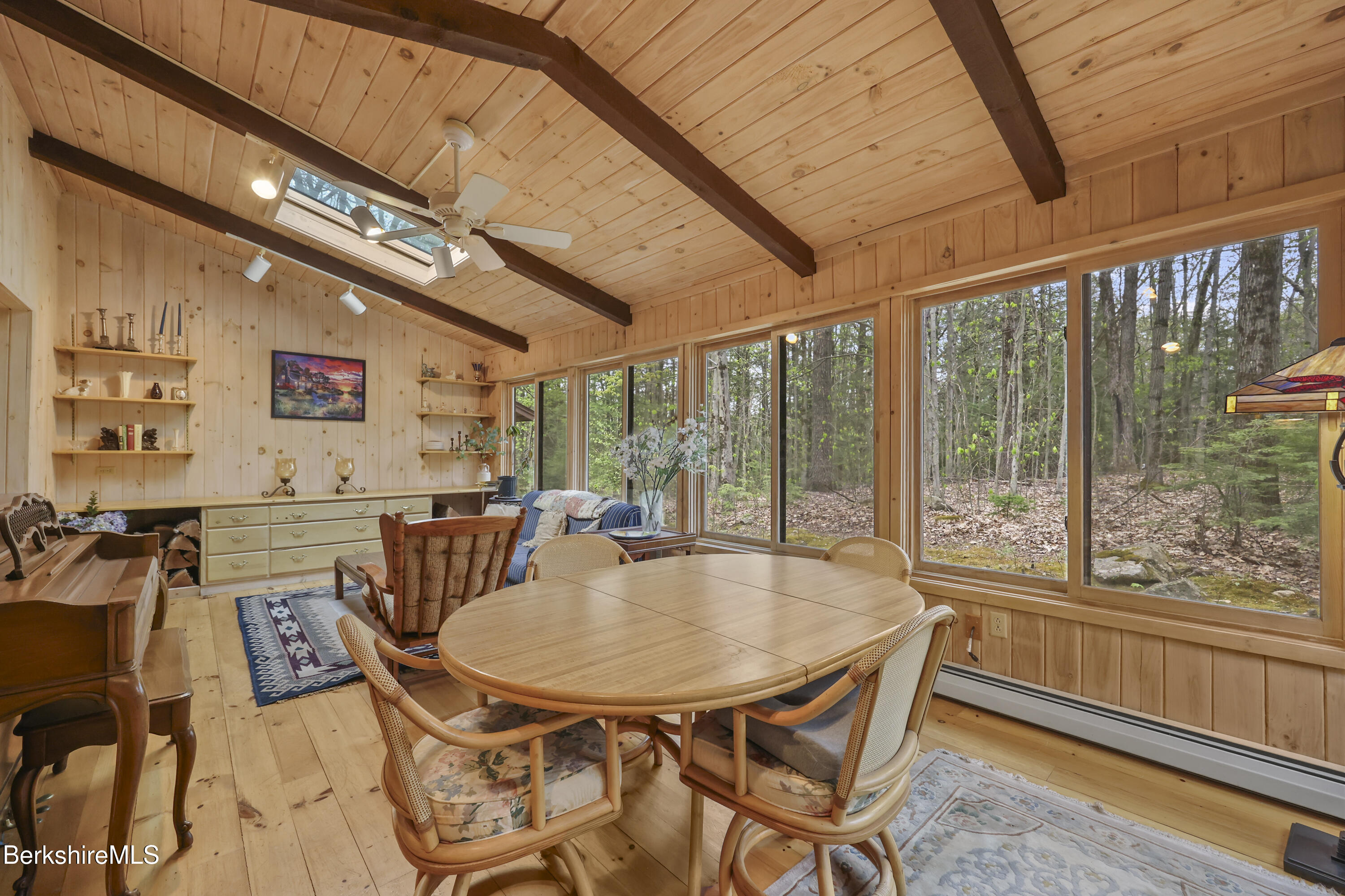 422 Bonny Rigg Hill Road Becket, MA 01223 - Photo 34 of 60 a outdoor dining area with furniture and a large window