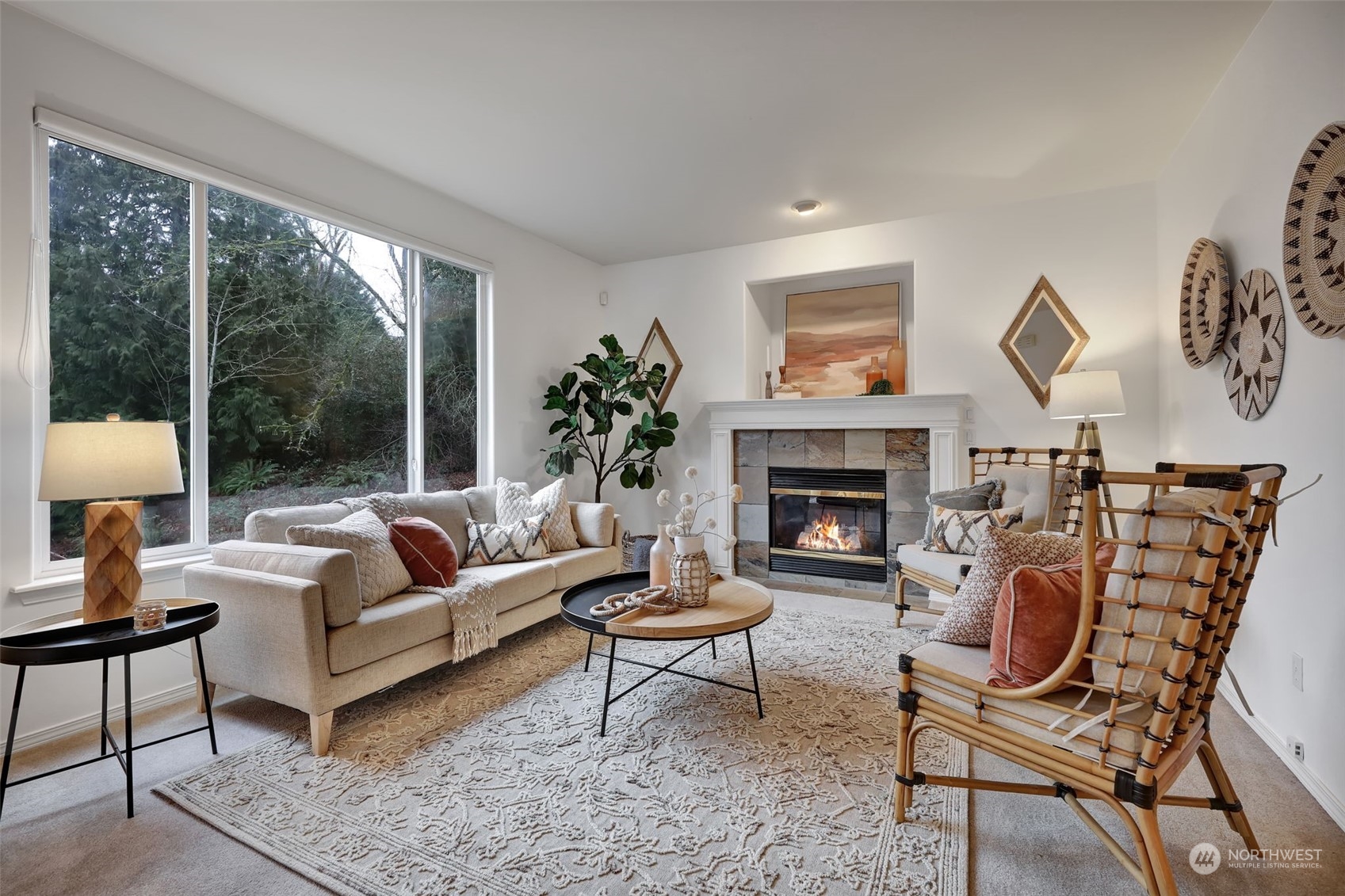 3714 Lincoln Court Northeast Renton, WA 98056 - Photo 13 of 33 a living room with furniture a table and a fireplace