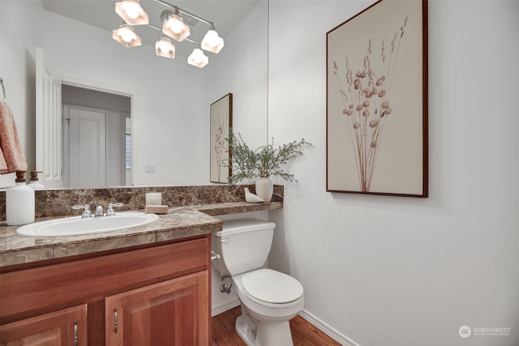 3714 Lincoln Court Northeast Renton, WA 98056 - Photo 14 of 33 a bathroom with a toilet sink and mirror