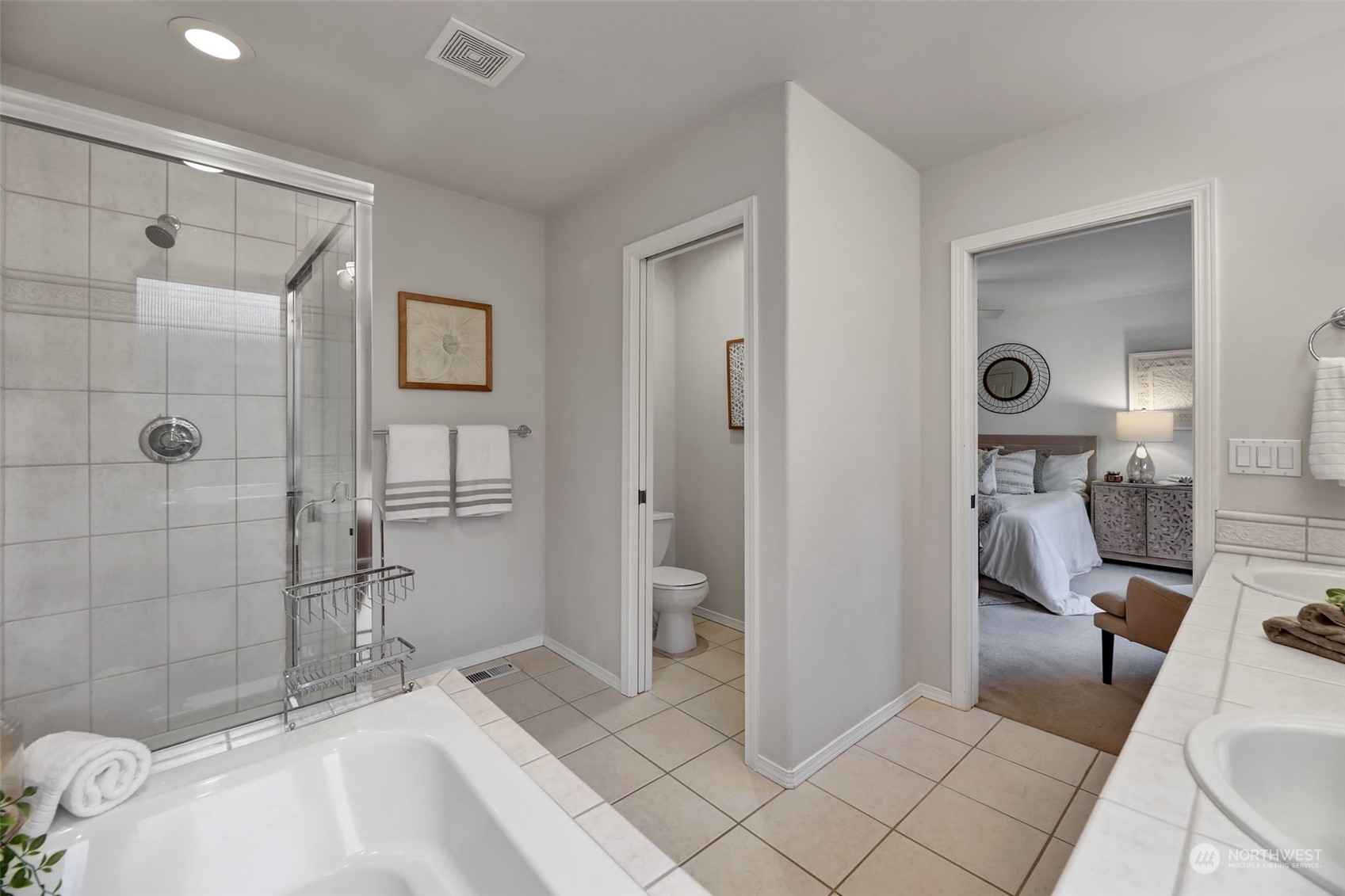 3714 Lincoln Court Northeast Renton, WA 98056 - Photo 19 of 33 a spacious bathroom with a sink and a shower