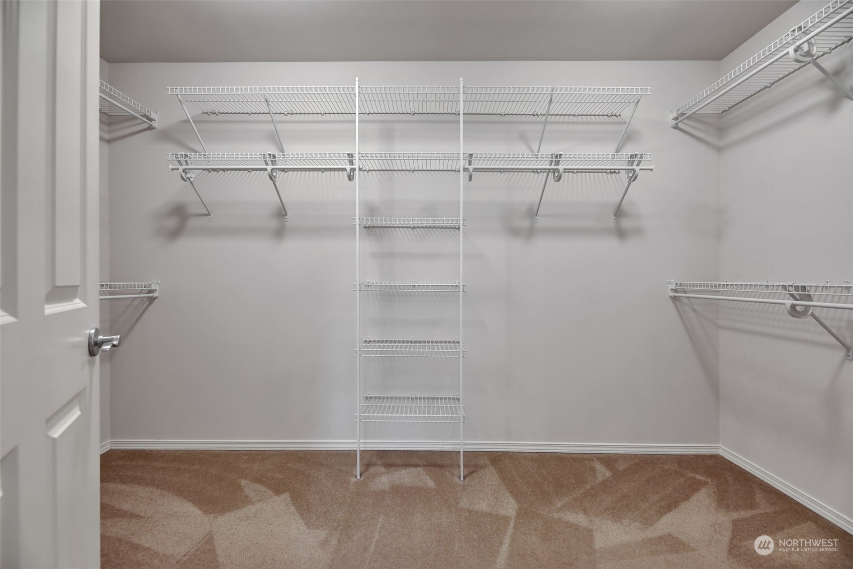 3714 Lincoln Court Northeast Renton, WA 98056 - Photo 20 of 33 a view of a room with racks on the wall