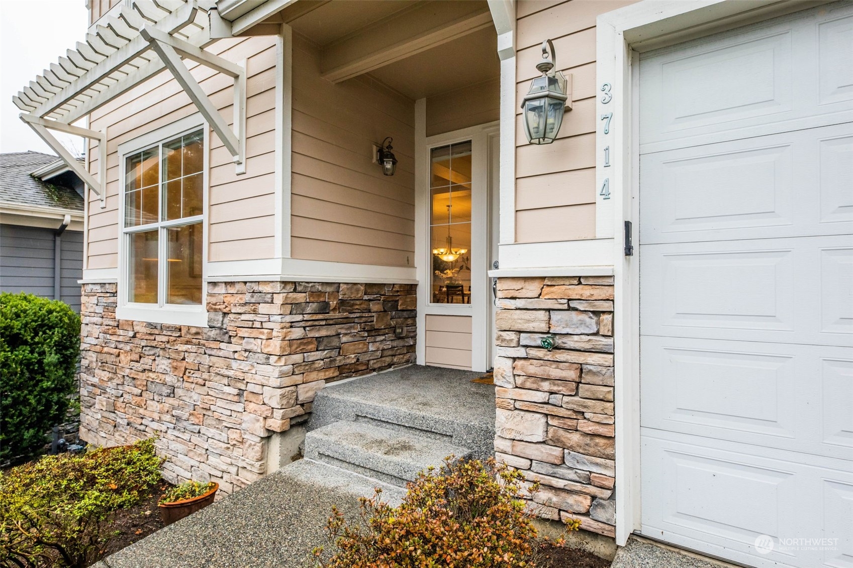 3714 Lincoln Court Northeast Renton, WA 98056 - Photo 2 of 33 a view of front door of house
