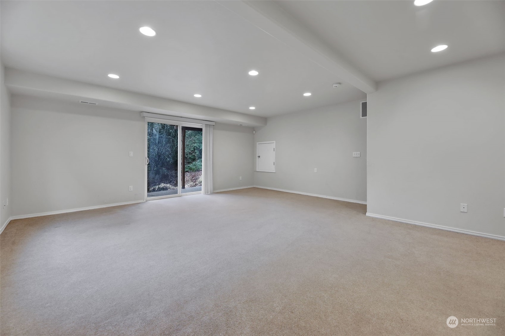 3714 Lincoln Court Northeast Renton, WA 98056 - Photo 28 of 33 a view of an empty room with wooden floor
