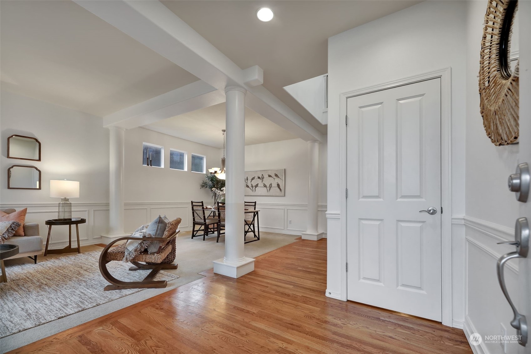 3714 Lincoln Court Northeast Renton, WA 98056 - Photo 3 of 33 a an empty room with wooden floor and a mirror
