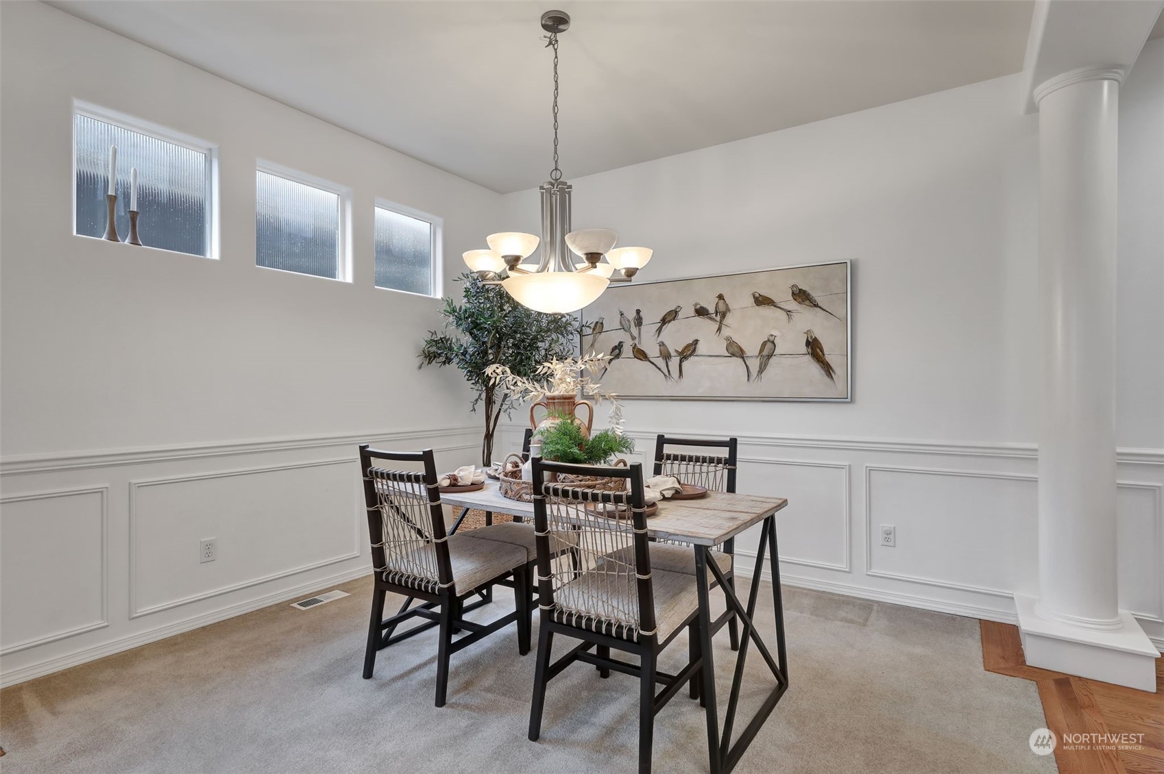 3714 Lincoln Court Northeast Renton, WA 98056 - Photo 6 of 33 a view of a dining room with furniture and chandelier