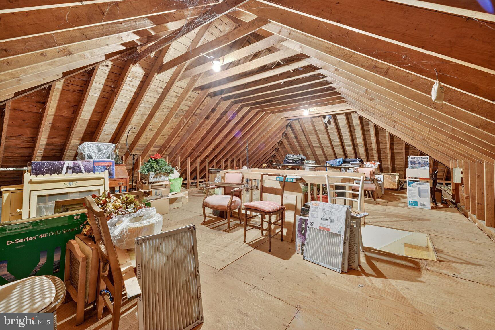 7205 Helmsdale Road Bethesda, MD 20817 - Photo 36 of 43 Full-height, floored attic for long-kept treasures