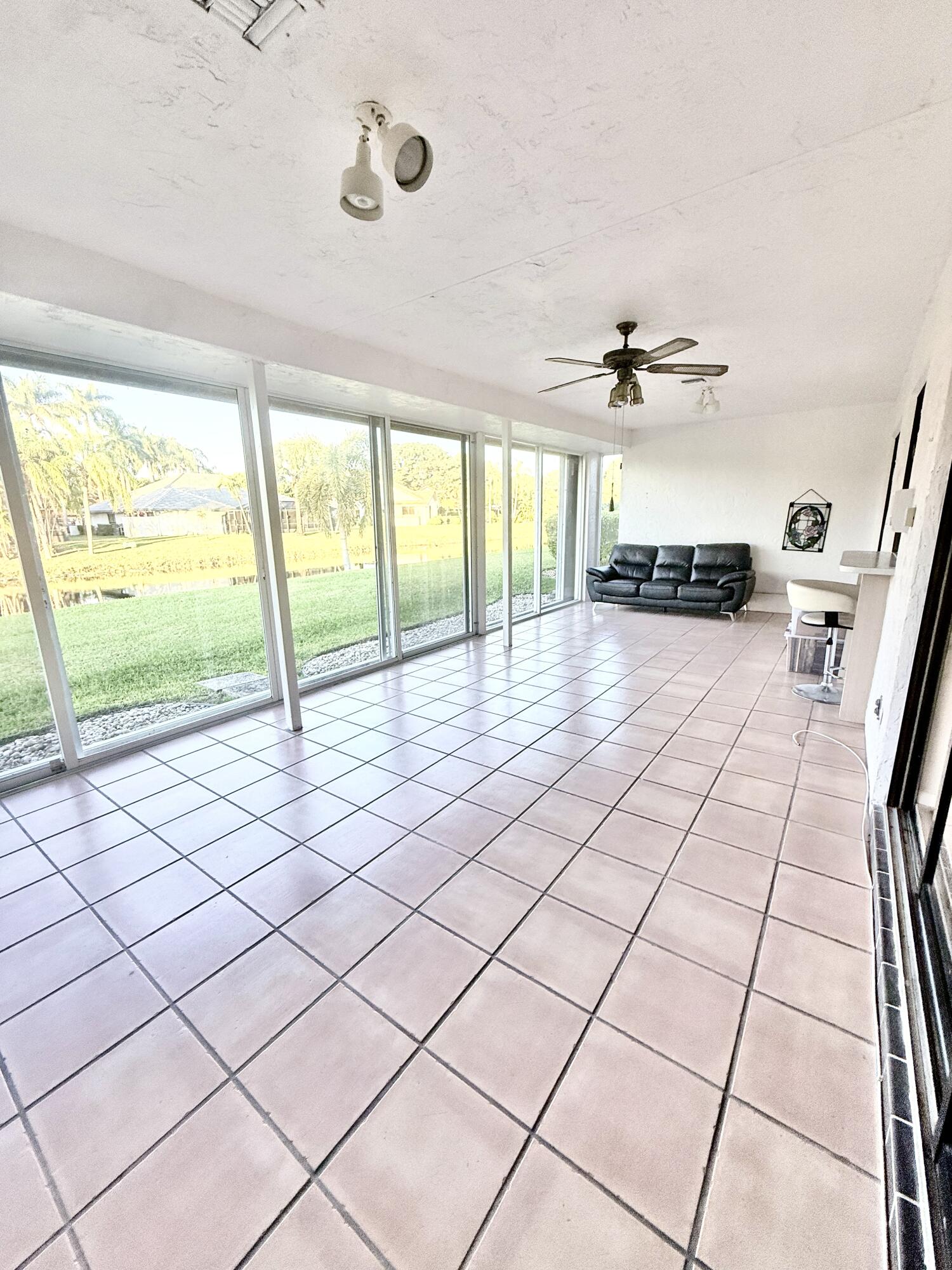 7024 Golf Pointe Circle Tamarac, FL 33321 - Photo 24 of 28 a view of an empty room and window