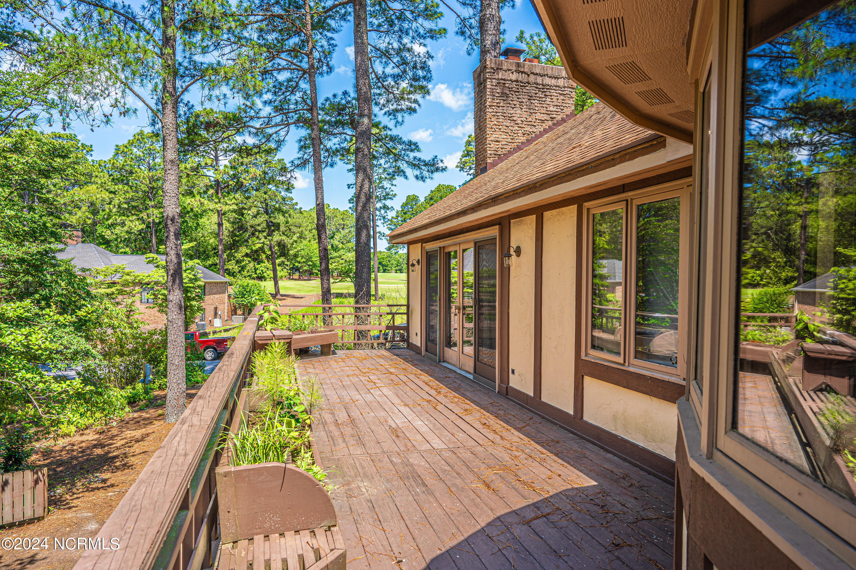 3 Thunderbird Circle Pinehurst, NC 28374 - Photo 2 of 25 Expansive back deck with incredible views of Pinehurst No 1