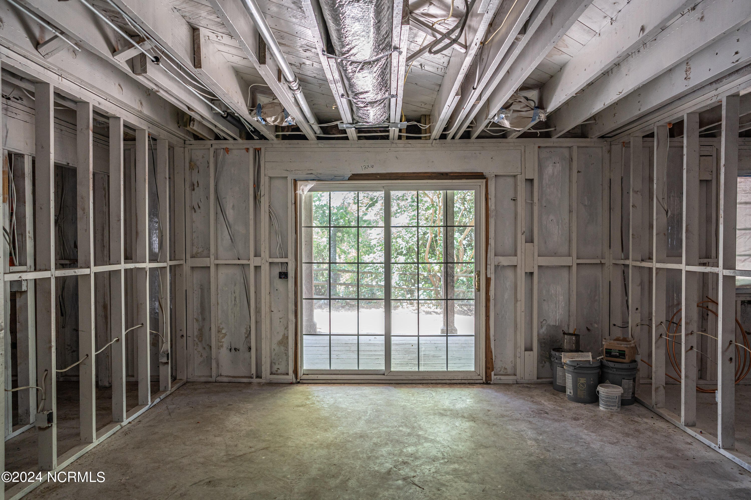 3 Thunderbird Circle Pinehurst, NC 28374 - Photo 19 of 25 Lower level family room, New Pella windows and doors in some areas