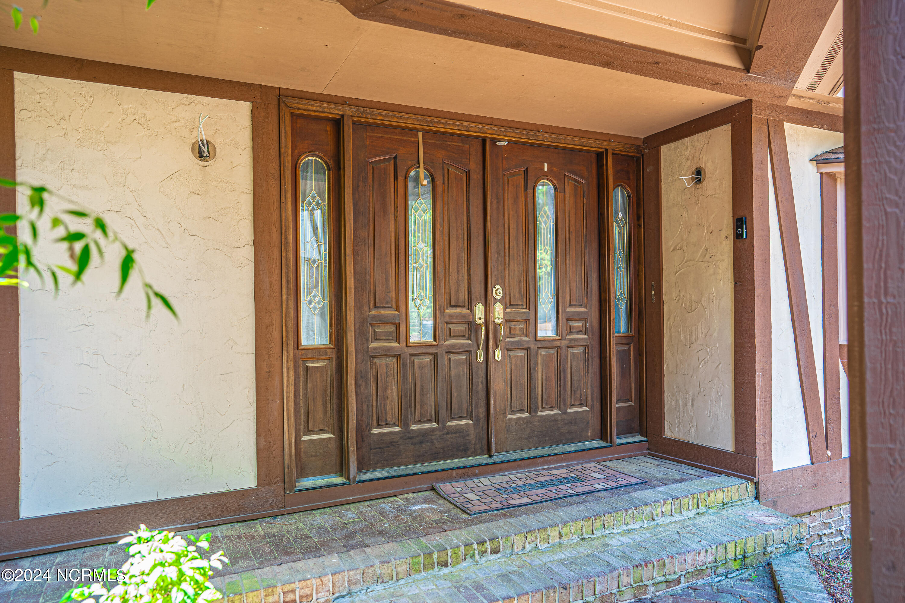 3 Thunderbird Circle Pinehurst, NC 28374 - Photo 7 of 25 Handsome wooden doors at main entrance