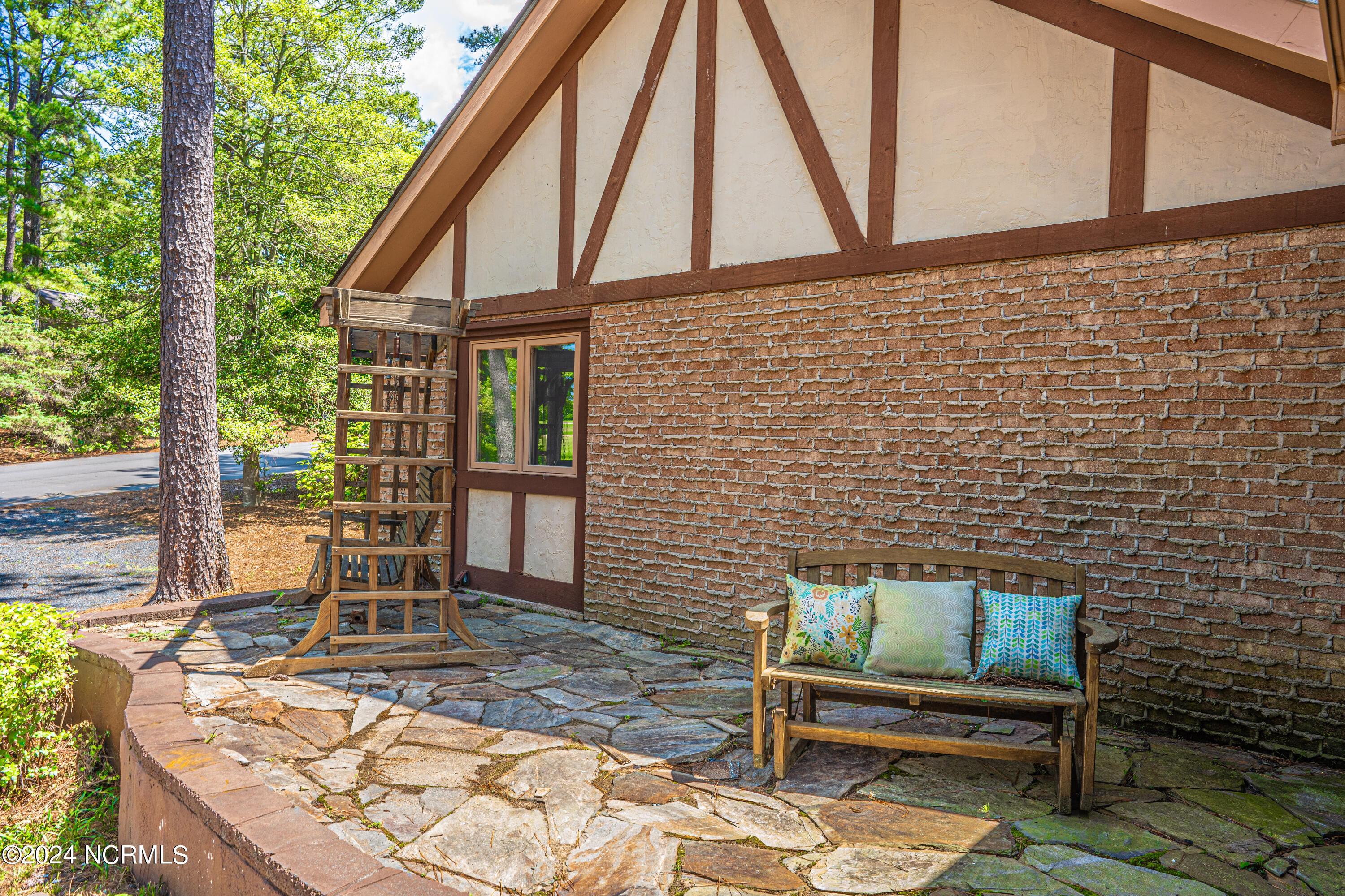 3 Thunderbird Circle Pinehurst, NC 28374 - Photo 8 of 25 Stone patio behind garage