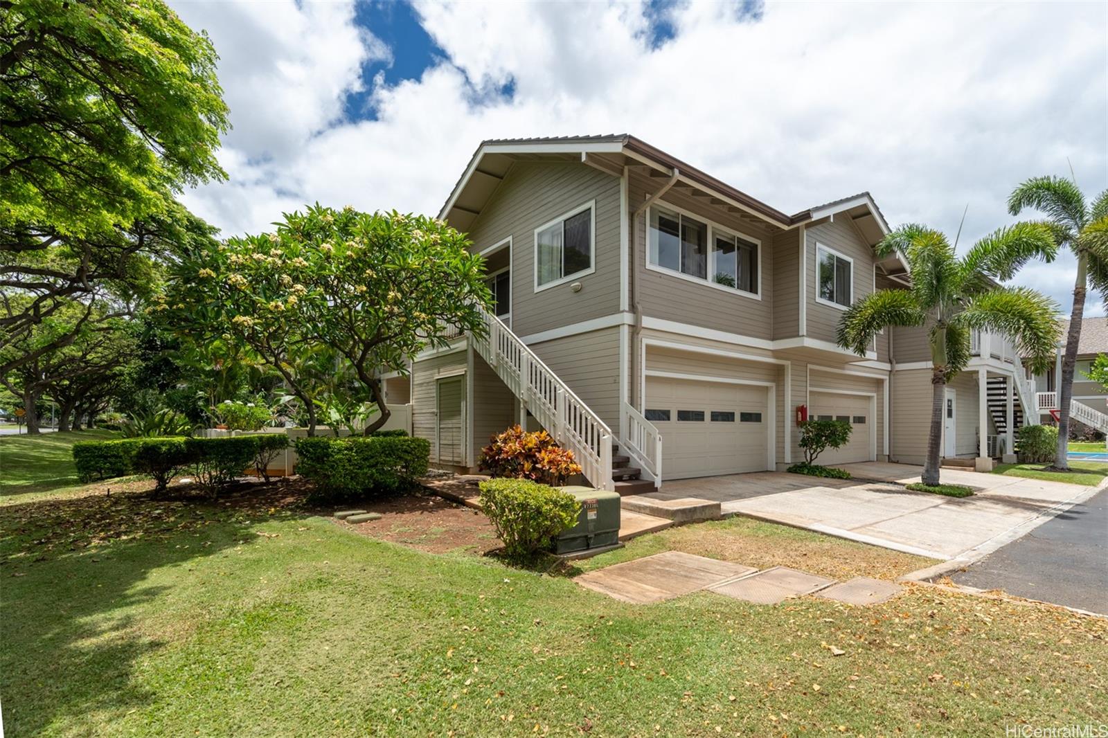 92-1487-a Aliinui Drive, Unit 27A Kapolei, HI 96707 - Photo 17 of 24 a view of a house with a yard