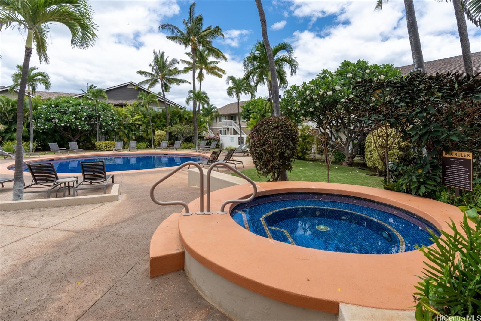 92-1487-a Aliinui Drive, Unit 27A Kapolei, HI 96707 - Photo 22 of 24 a view of swimming pool with outdoor seating and plants