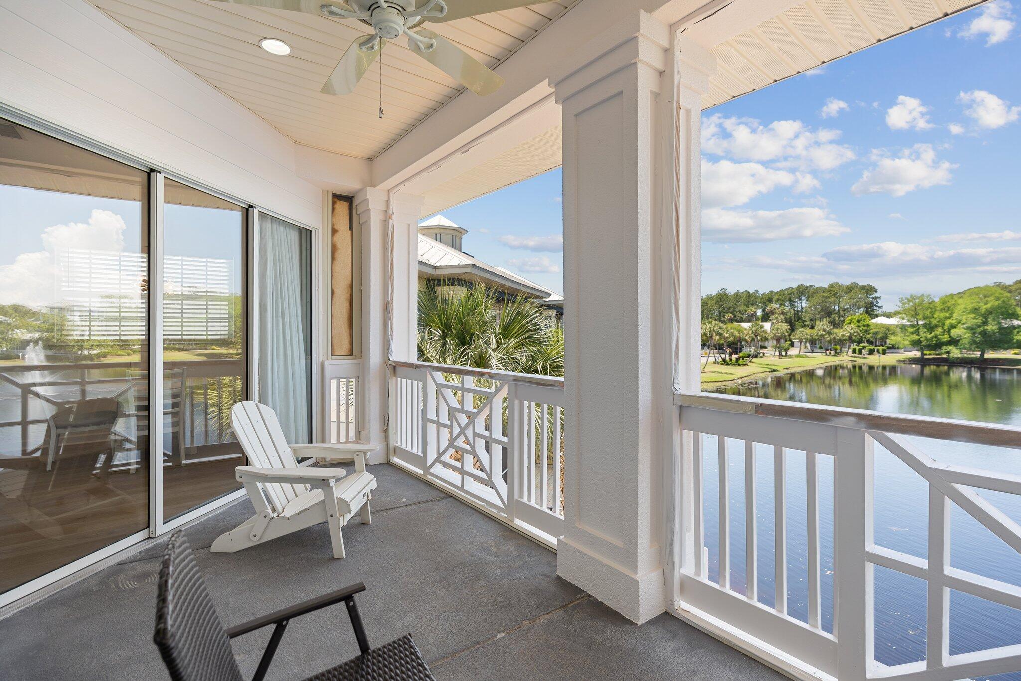 2221 Crystal Cove Lane, Unit 2221 Miramar Beach, FL 32550 - Photo 1 of 32 a living room with hardwood floor and balcony view