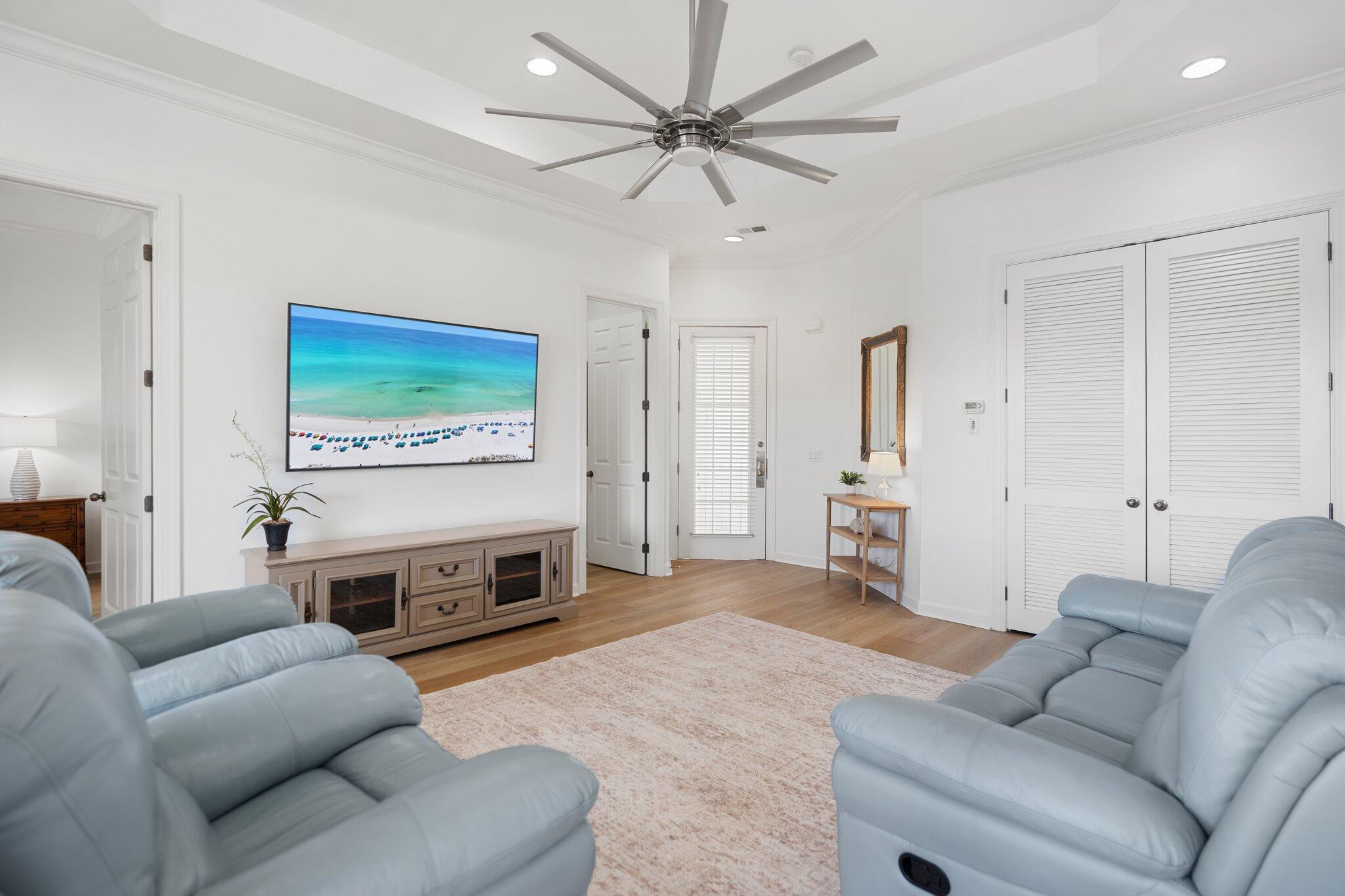 2221 Crystal Cove Lane, Unit 2221 Miramar Beach, FL 32550 - Photo 11 of 32 a living room with furniture and a fireplace