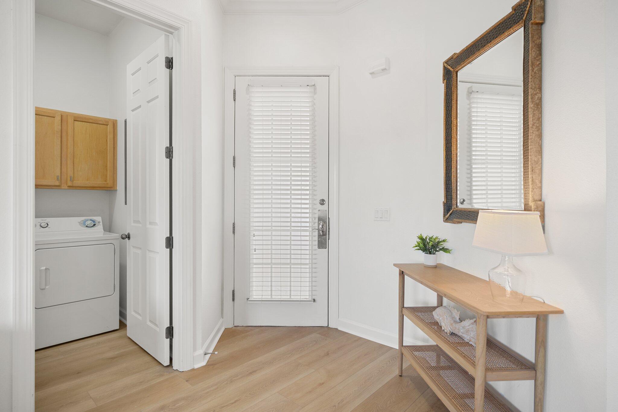 2221 Crystal Cove Lane, Unit 2221 Miramar Beach, FL 32550 - Photo 12 of 32 a view of an entryway with wooden floor