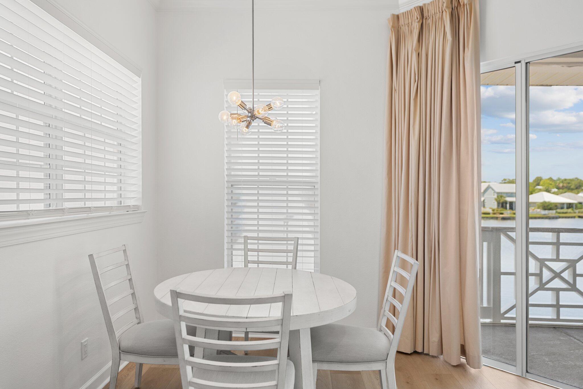 2221 Crystal Cove Lane, Unit 2221 Miramar Beach, FL 32550 - Photo 16 of 32 a view of a dining room with furniture window and outside view