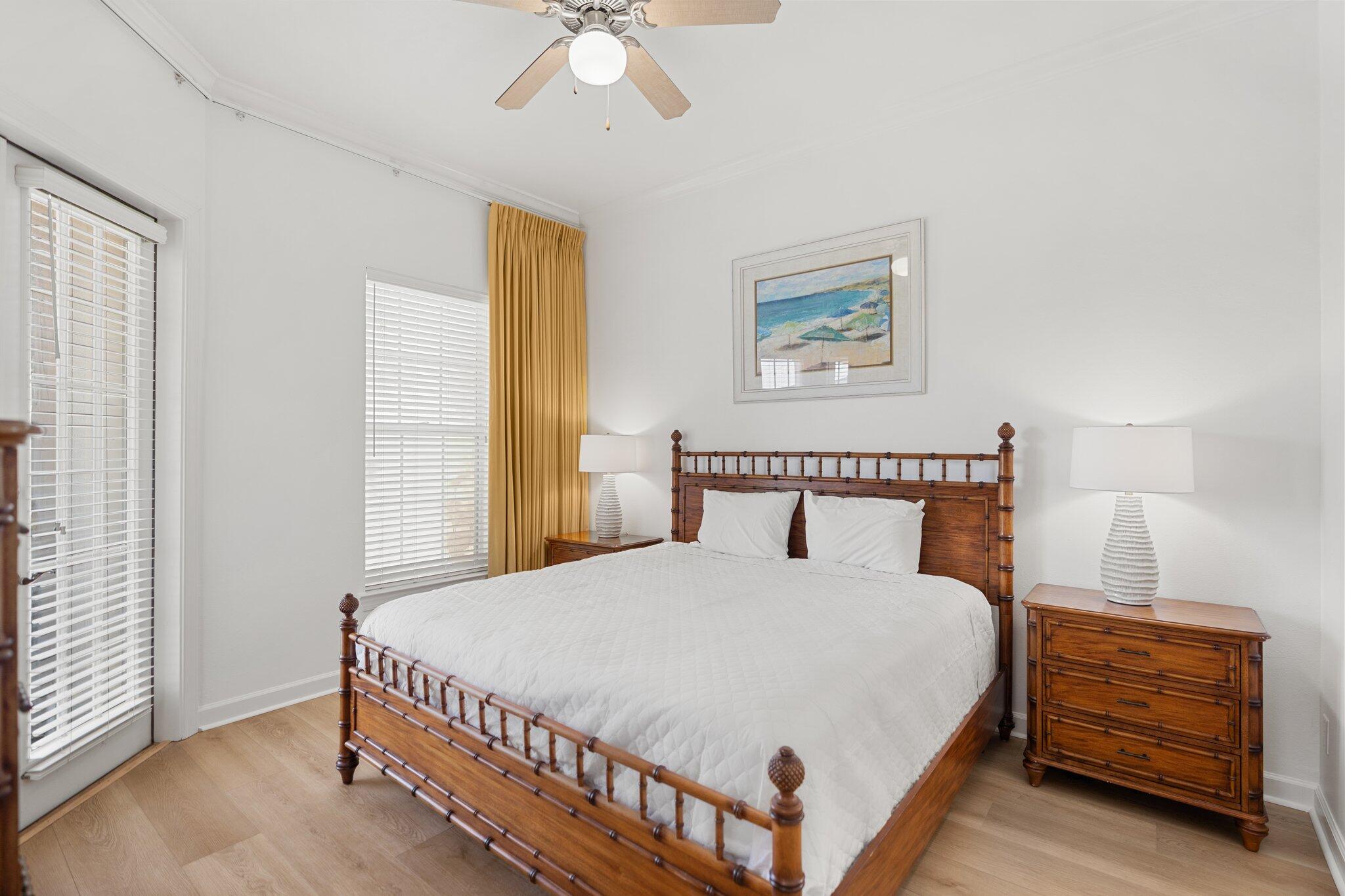 2221 Crystal Cove Lane, Unit 2221 Miramar Beach, FL 32550 - Photo 21 of 32 a bedroom with a bed and a dresser