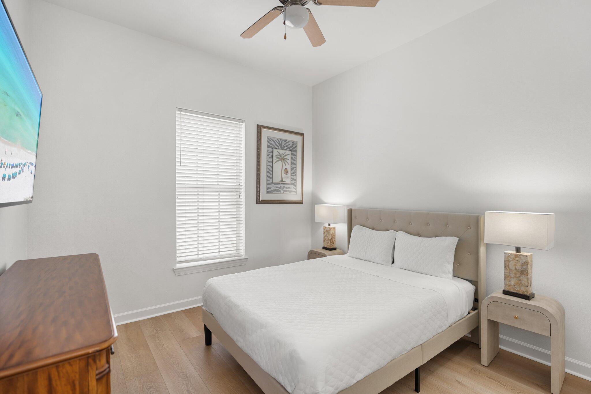 2221 Crystal Cove Lane, Unit 2221 Miramar Beach, FL 32550 - Photo 25 of 32 a bedroom with a bed and a window