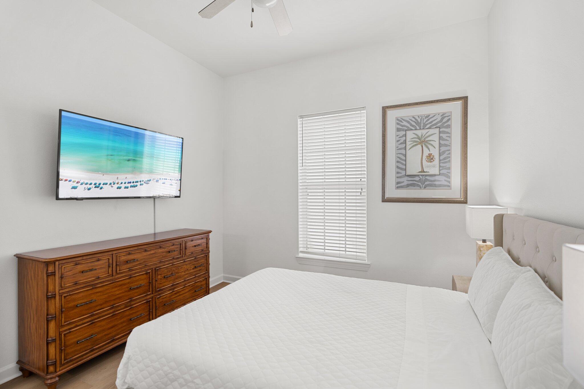 2221 Crystal Cove Lane, Unit 2221 Miramar Beach, FL 32550 - Photo 26 of 32 a bedroom with a bed and a window