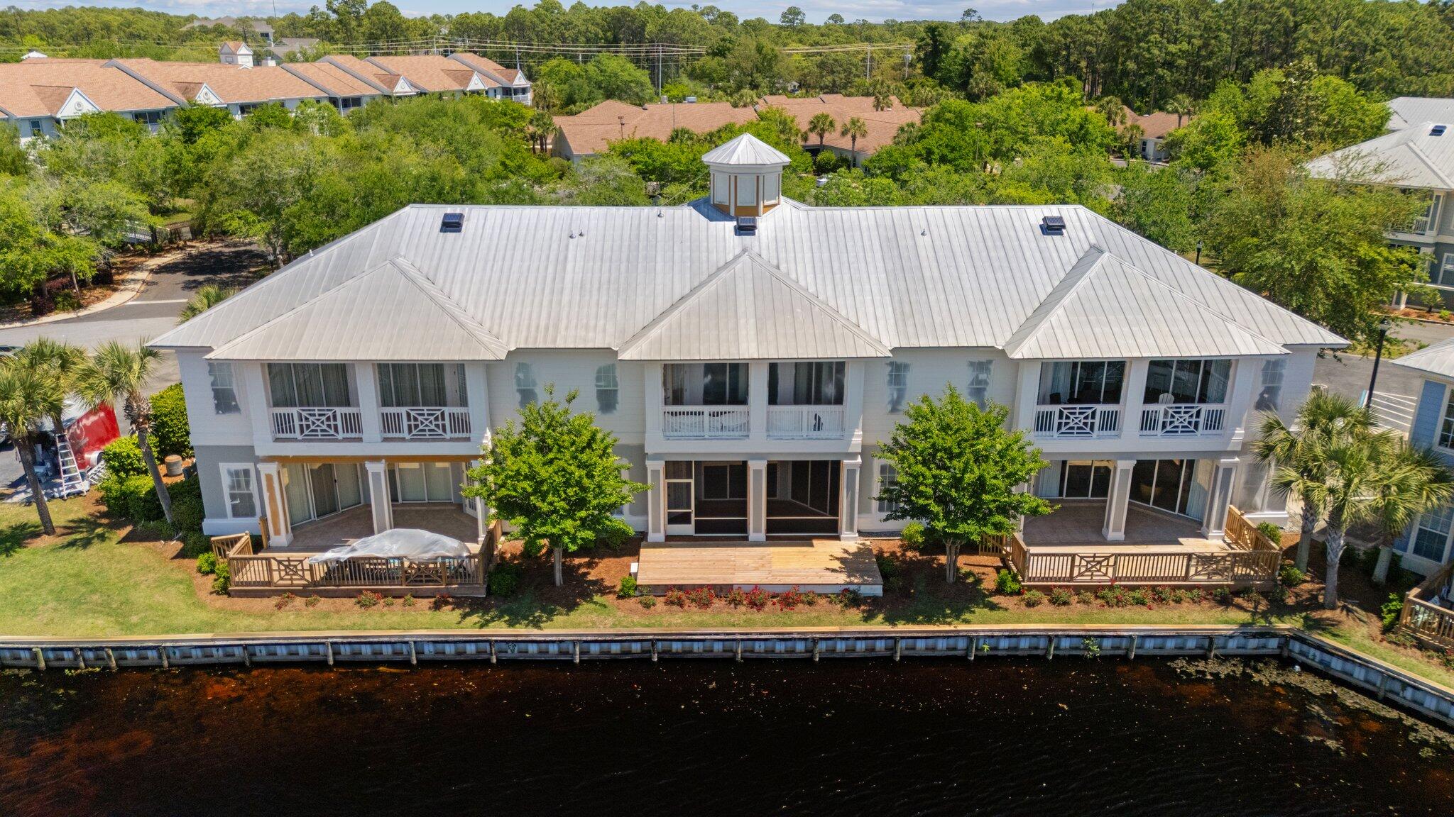 2221 Crystal Cove Lane, Unit 2221 Miramar Beach, FL 32550 - Photo 28 of 32 a house view with a garden space