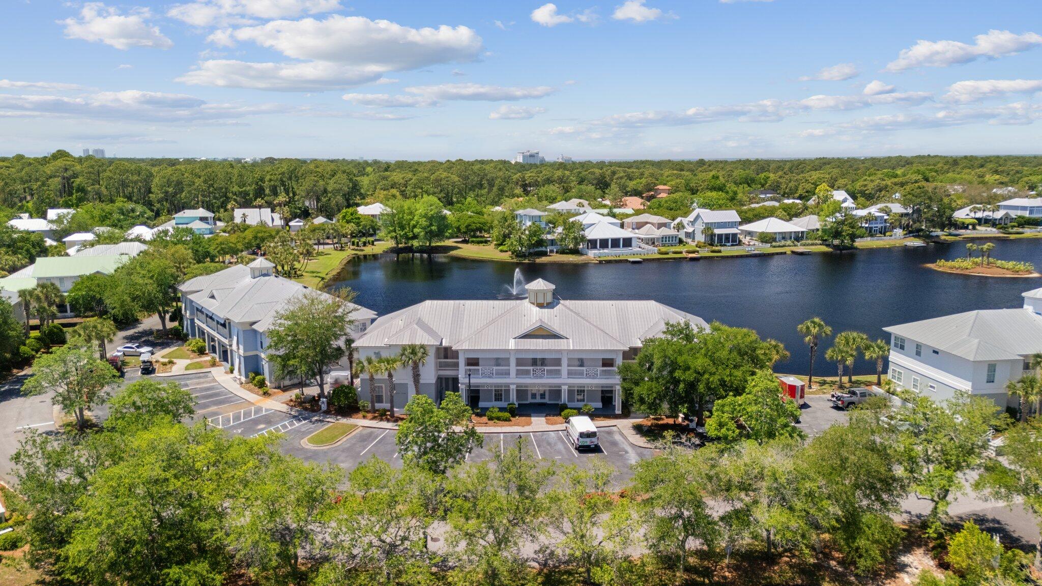 2221 Crystal Cove Lane, Unit 2221 Miramar Beach, FL 32550 - Photo 5 of 32 an aerial view of a house with a lake view