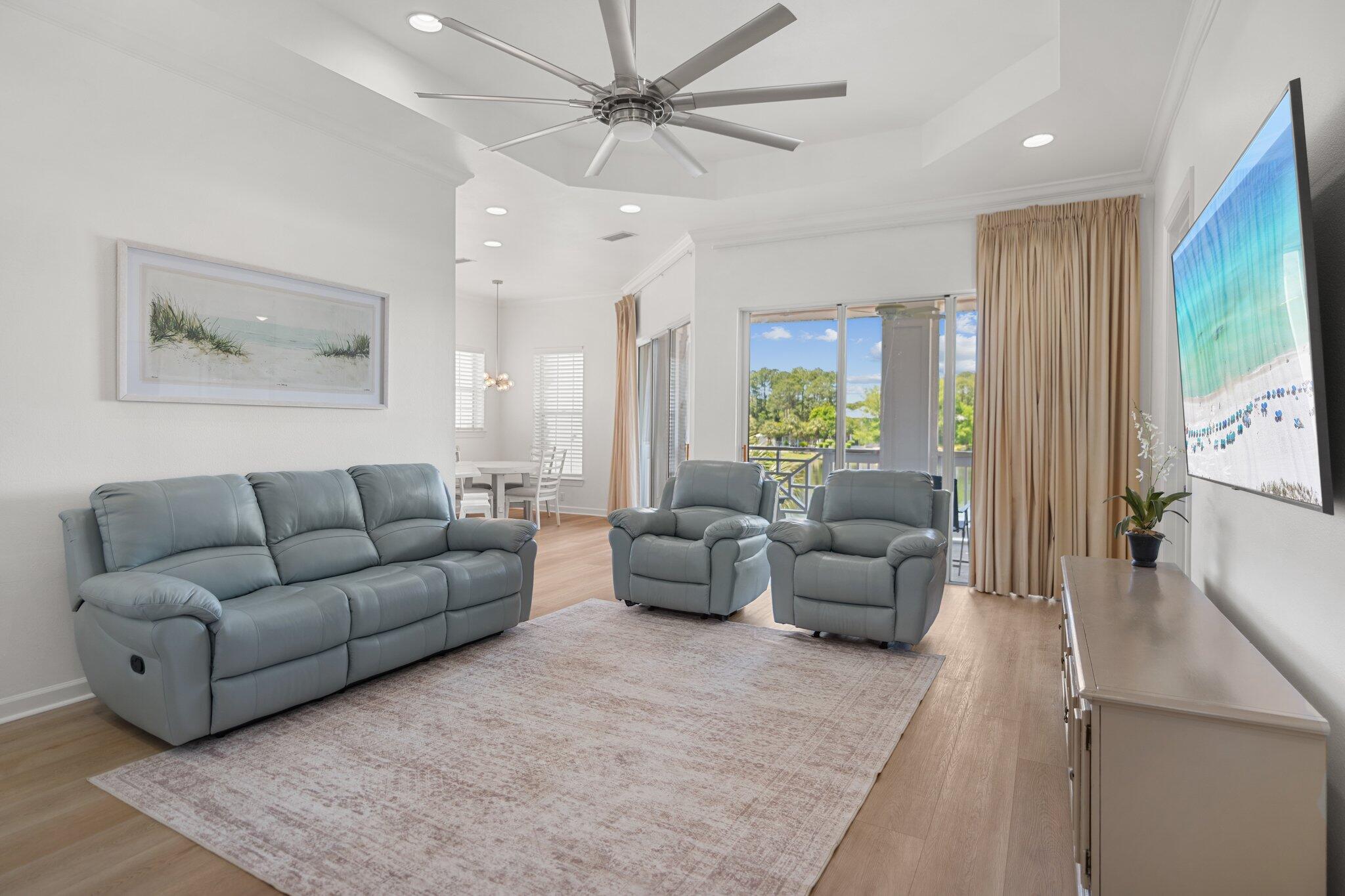 2221 Crystal Cove Lane, Unit 2221 Miramar Beach, FL 32550 - Photo 7 of 32 a living room with furniture and a large window