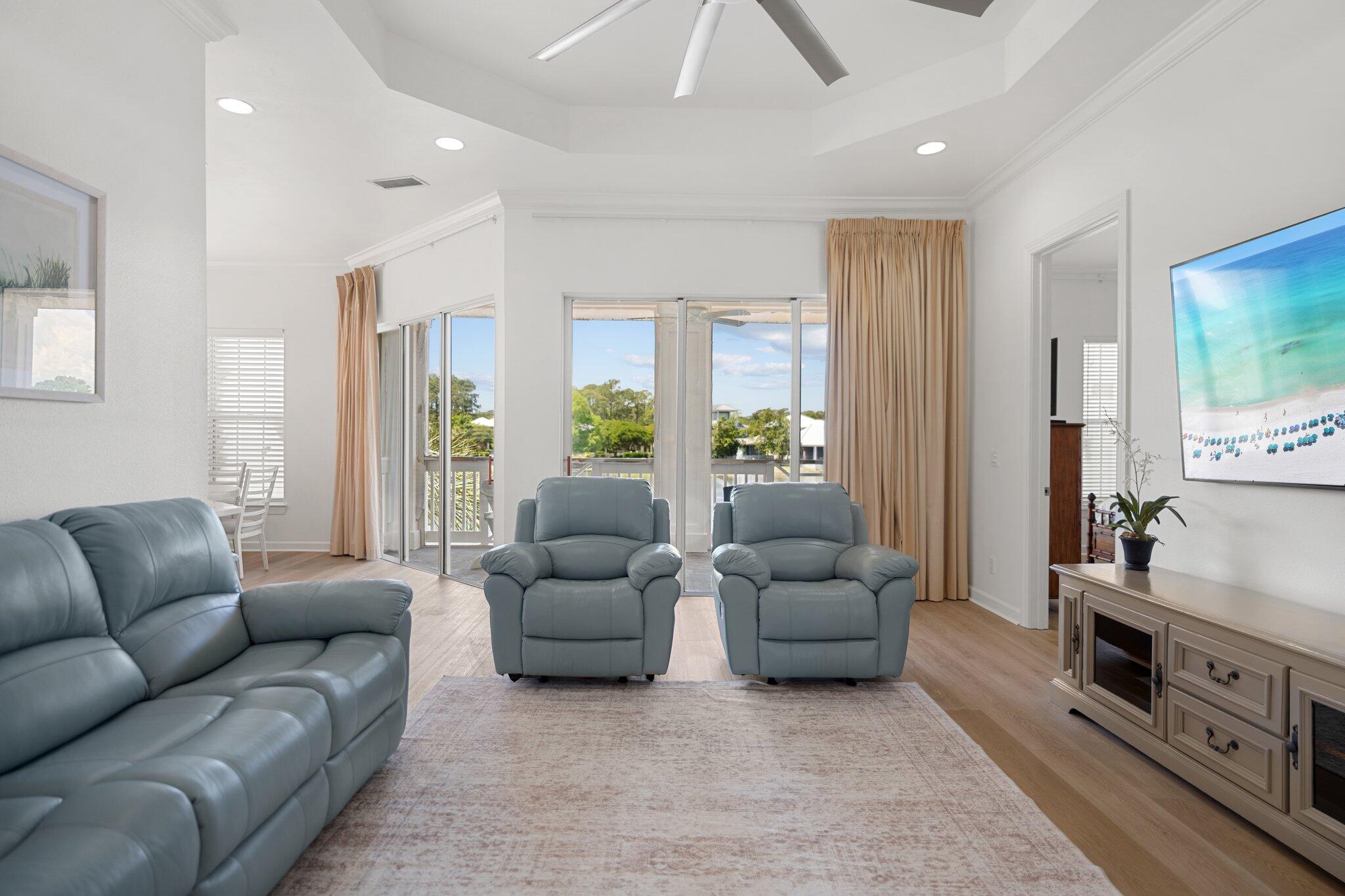 2221 Crystal Cove Lane, Unit 2221 Miramar Beach, FL 32550 - Photo 8 of 32 a living room with furniture and a flat screen tv