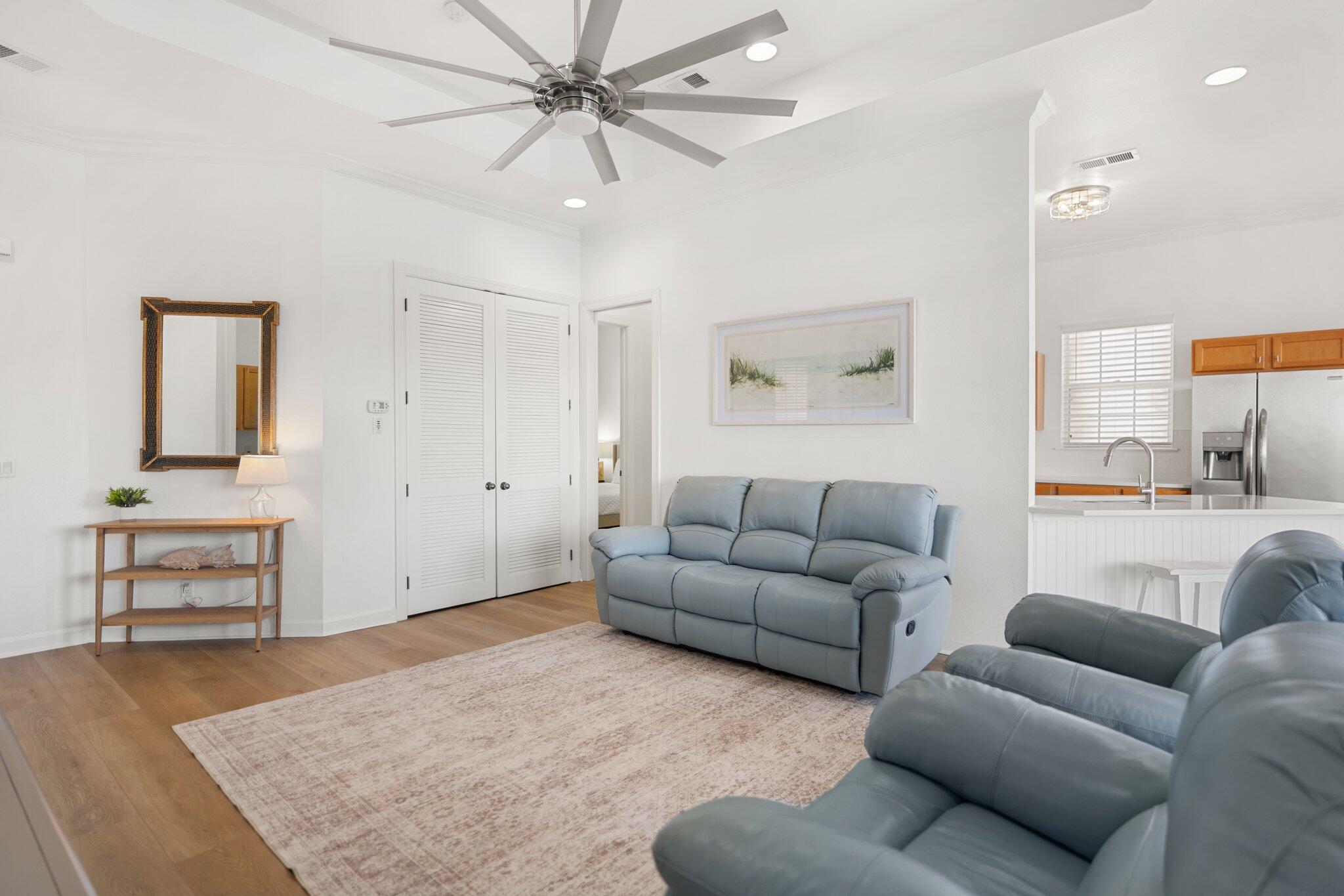 2221 Crystal Cove Lane, Unit 2221 Miramar Beach, FL 32550 - Photo 10 of 32 a living room with furniture and a table
